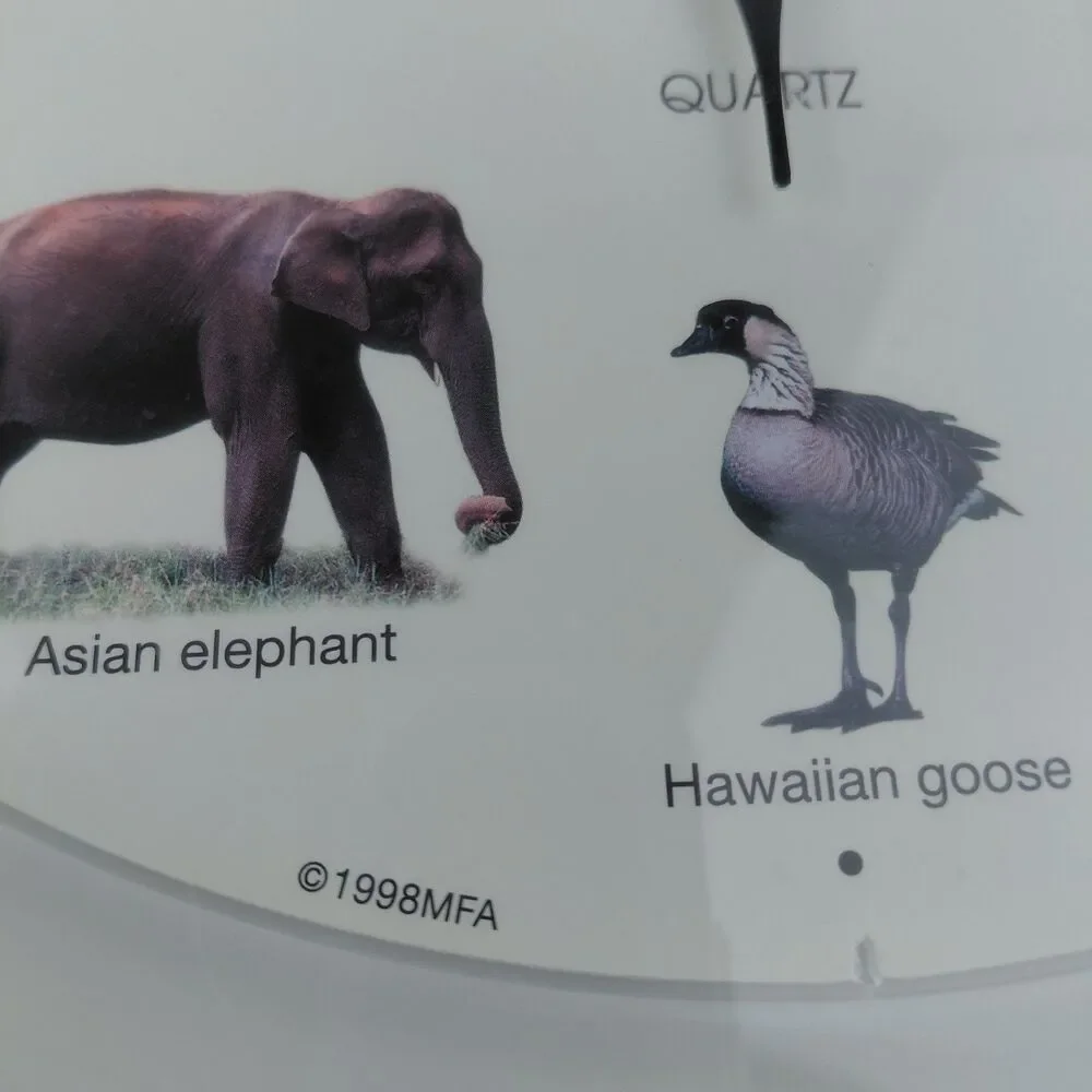 WWF Wild Animal Endangered Species Wall Clock with Hourly Animal Calls Working